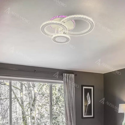 LED lustr s dálkovým ovládáním a krystalem LEOCADIA RGB 134W, 3 kruhy, studené/teplé/neutrální světlo, stmívatelné, bílý křišťálový LED lustr Výchozí název Alessandro Design